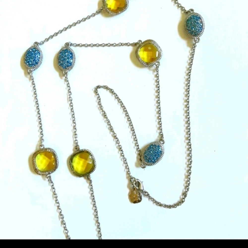 Free W $50+ Purchase. Chic Silver Tone Necklace with Yellow and Blue Gemlikes